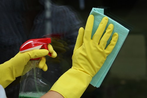 Office cleaning team working in a modern EN5 workplace reception area