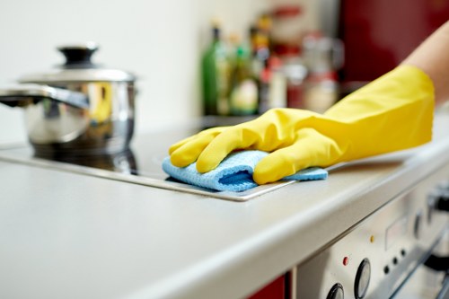 Carpet cleaning team reviewing ethical labour compliance in EN5