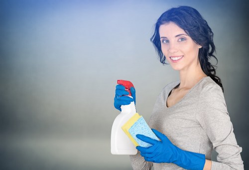 Local cleaning team preparing a tidy living room in EN5